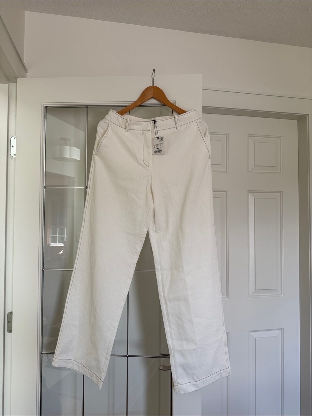 White pants with stitching